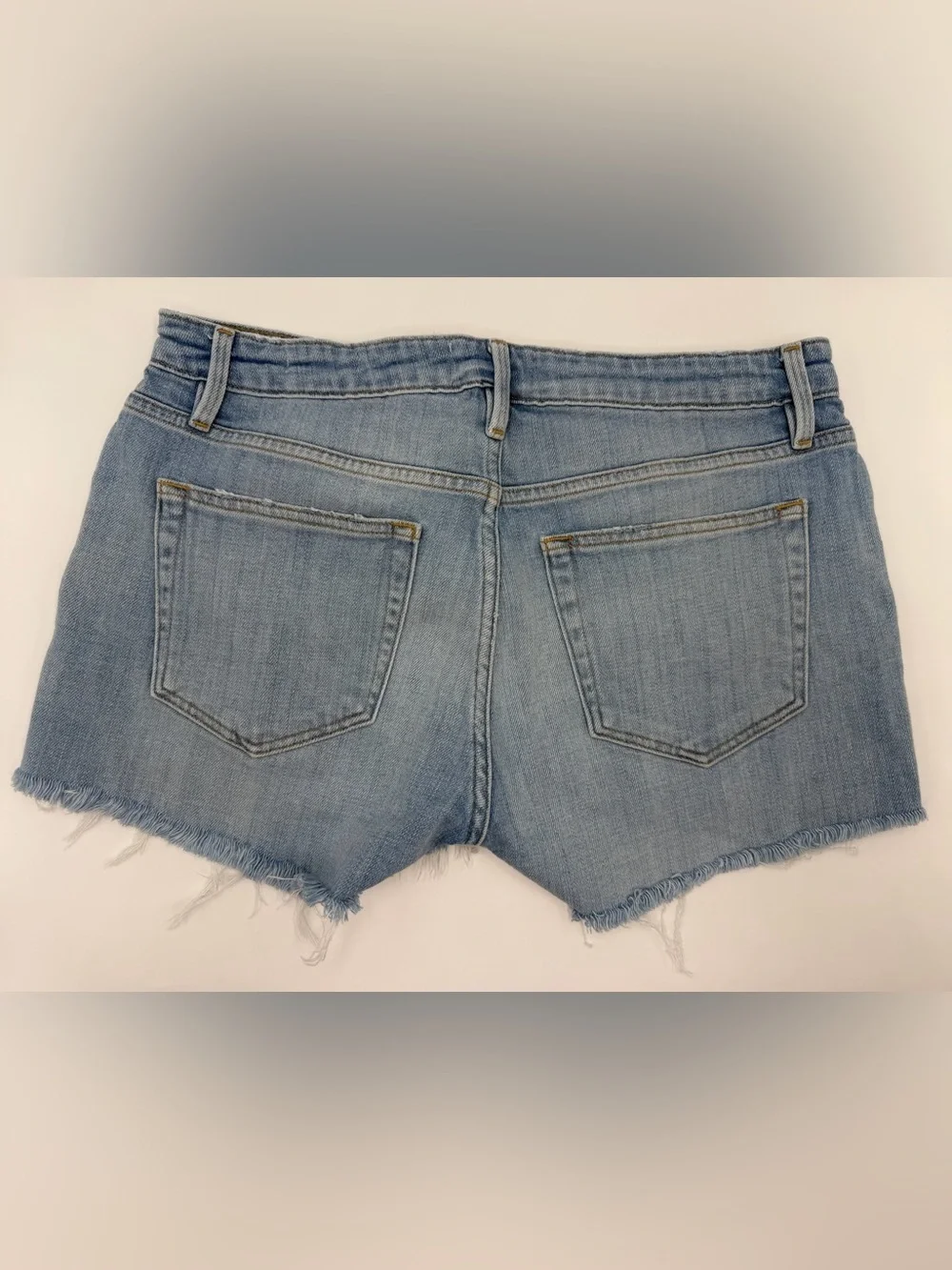 Frame Denim Shredded Raw-Edge Denim Shorts in Hurrah 26